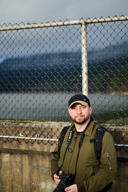 Steven on a dam with a camera